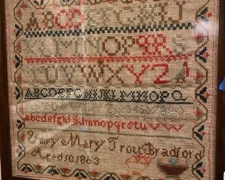 Antique dated Sampler in vintage frame.