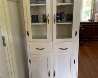 Vintage Kitchen Cabinet - This would make great towel storage in a bathroom.