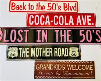29/  Grouping of metal advertising signs 35” long and skinny • set of 5 • $25