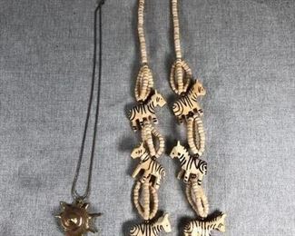 Shell necklace and wooden zebra necklace