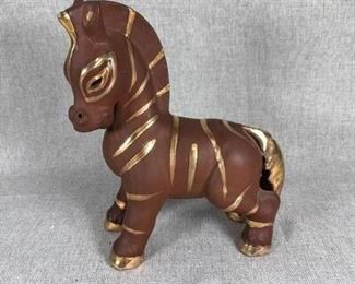 Pottery and gold horse zebra figurine