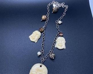 Carved Buddha Face Charm Necklace