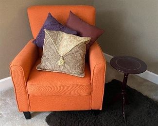 1 of 2 orange chairs