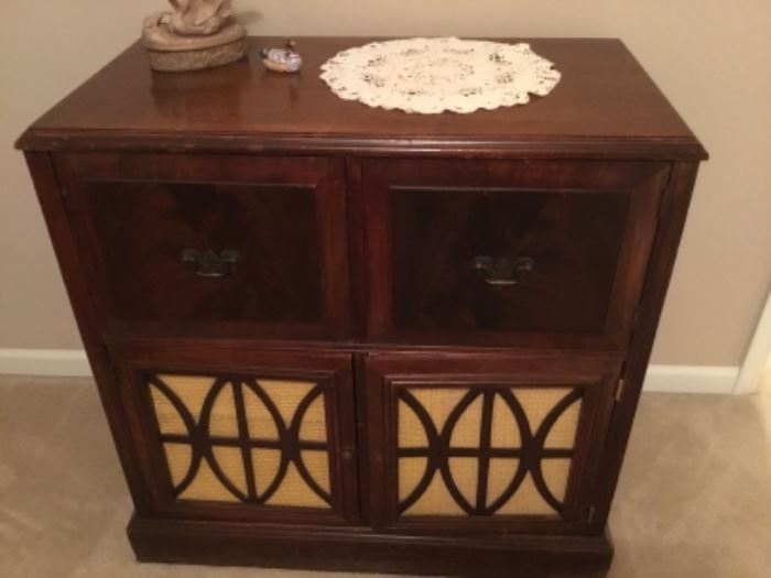 Vintage record/radio cabinet with components removed. 