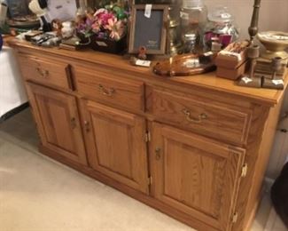 Credenza with miscellaneous decor - has lots of storage