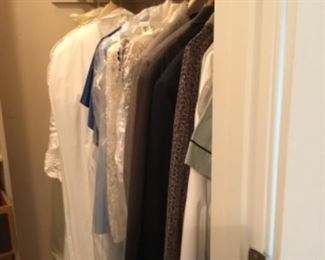 Downstairs second bedroom closet. -  3 piece wedding gown