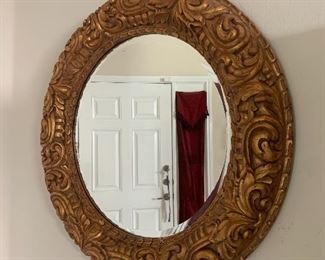 $375- Beautiful ornate gold beveled mirror 