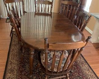 $475- Beautuful Pine Ethan Allen table and six chairs  with two leaves and pads 