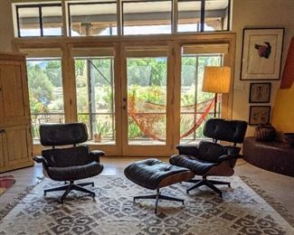 MCM Eames Lounge Chair and Ottoman by Herman Miller; MCM Eames Lounge Chair Black Leather by Herman Miller; Entertainment Center Southwest Style by Mcmillian's of Santa Fe                                                                             