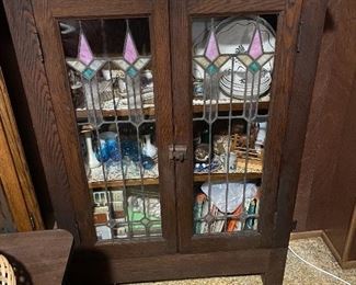 Quarter sawn bookcase with stained glass