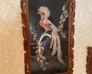 Ornate frame with bird made of real feathers