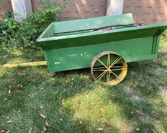 Very cool green wagon with vintage metal yellow wheels