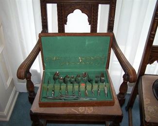 STAINLESS FLATWARE SET (CHAIRS NOT FOR SALE--FAMILY DECIDED TO KEEP THE DINING SET)