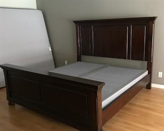 Ashley Porter Cal King Panel StyleBed in Rustic Brown. Retail price, $705. Sale price here: $350. *INCLUDES HEADBOARD, FOOTBOARD AND SIDE RAILS. DOES NOT INCLUDE MATTRESS OR BOX SPRING.*