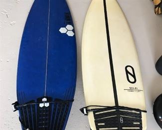 Surfboards: (Blue) Al Merrick 5'5", $299 and (Yellow) TOMO LFT  5'7", $225 