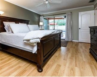 Ashley Porter Cal King Panel StyleBed in Rustic Brown. Retail price, $705. Sale price here: $350. *INCLUDES HEADBOARD, FOOTBOARD AND SIDE RAILS. DOES NOT INCLUDE MATTRESS OR BOX SPRING.*  Floor lamp: $35