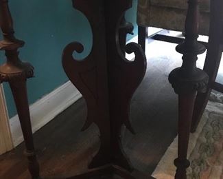 English Victorian center table with intricate detail 