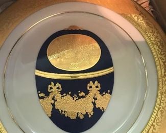 Set of gilt porcelain Faberge plates