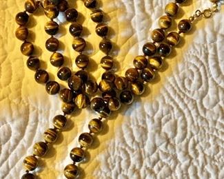 $45 Long tiger's eye necklace 30" Long individually knotted 