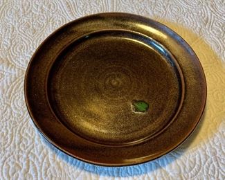 $35 Marked stoneware plate.  11" diam, 1.5" H. 