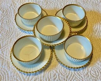 $ 50 Set of  vintage porcelain custard cups and matching plates.  4 cups available (one damaged) each 3" diam, 1.5" H.  7 plates available each 4.25" diam.