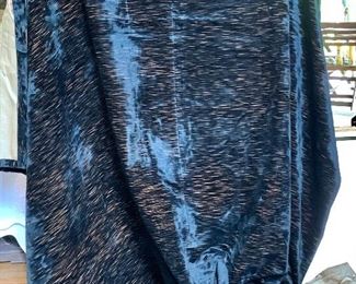 Black woven silk (?) and lined draperies.  2 panels available each approx 94" H, 60" W. 