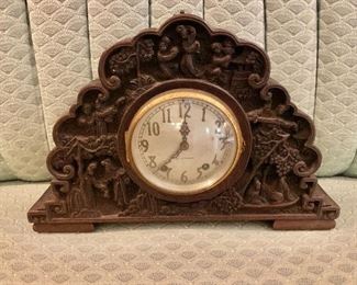 $275   Wood carved mantle Seth Thomas clock.   9" H,  13.5" W, 3.5" D.