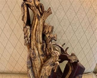 $100  Wood carving of scene, some gilt.   17" H,  10" W, 3" D.