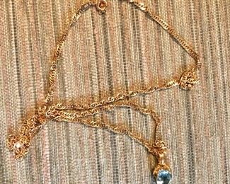 $450 18K gold chain and 14k  blue topaz pendant Chain 16", pendant 1/2" 