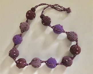 $22 Purple beaded necklace 18" L beaded 3/4" in diameter 