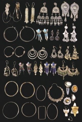 1	Grouping of Silver Earrings	Mostly sterling, some unmarked. 17 complete pairs, including signed, hoops, ear clips, lapis, onyx, Mexican; and 38 single earrings. 406.3 grams total, not including earrings with stones.
