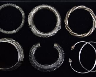 13	Grouping of Silver Bracelets	10 silver bracelets, including cuffs and bangles, Taxco, ATT. Mostly sterling, some unmarked. 576 grams total
