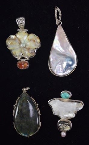 14	4 Sterling & Stone Pendants	4 sterling & stone pendants. Pin/pendant with quartz center, 3"L
