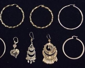 20	14k Gold Grouping	Grouping of miscellaneous 14k gold earrings including pairs and single earrings. 31.4 grams total
