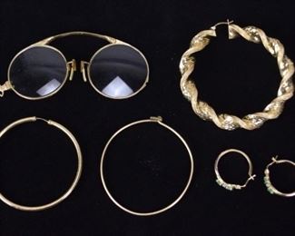23	10k & Gold Filled Jewelry	Pair of 12k gold filled eyeglasses; pair of 10k gold and green stone earrings, 2.3 grams including stones; 12k gold filled single earring, 3.6 grams; 10k single earring, 15.3 grams; 14/20 gold filled single earring, 3.7 grams. Glasses missing 1 lens
