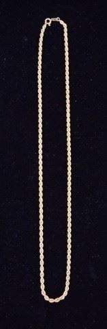 26	14 Karat Gold Chain	A 14 karat gold chain, weighing in at 9.9 grams. Good condition. 20.5" L
