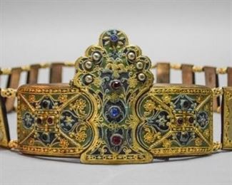 27	Russian Enamel, Filigree & Gold Tone Belt	Gold tone belt with silver tone decoration and enamel, filigree and jeweled buckle. 43"L

