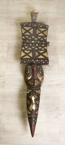 32	African Carved Wood Mask	46"L x 10"W. Chips, wear, paint loss.
