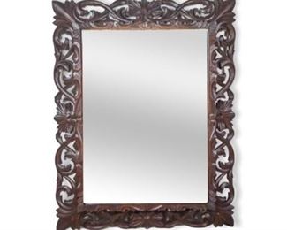 83	Carved Mirror	Carved wood mirror with beveled glass. 30"W x 38 1/2"H. Wear throughout
