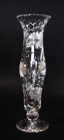 85	Cut Glass Daisy Motif Vase	Cut glass vase with Daisy motif. 18 1/4"H. Internal chip in base.
