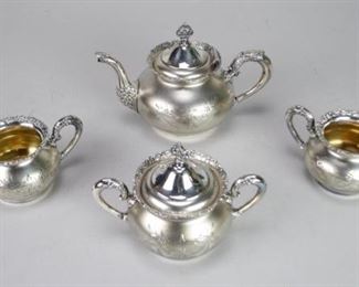 117	4 Piece Van Bergh Silverplate Tea Set	4 piece Van Bergh silverplate tea set, consisting of a teapot, covered sugar bowl, creamer and waste bowl. All with Van Bergh Silver Plate Co. Rochester, NY Quadruple Plate marks. Teapot 7"H including lid.
