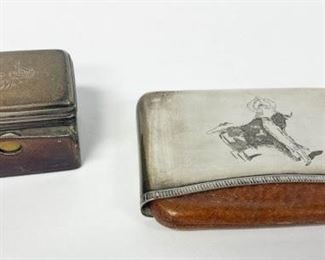 121	Silver & Leather Smoking Accessories	A silver and leather cigar case, engraved decoration depicting a bullfight, signed R. Marin, stamped on reverse Abuilera Sevilla 916, 4 1/2"L x 3"W, 2.84 ozt; leather wrapped match safe with silver top, monogrammed on lid, 2" x 1 1/2" x 1 1/2". Leather detached from match safe.
