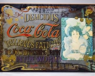 124	Coca-Cola Relieves Fatigue Advertising Mirror	Coca-Cola advertising mirror with print. Unframed. 36" x 24". Chips along bottom edge.
