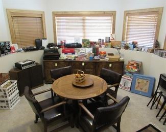 Vintage oak game table with Conant-Ball vinyl and wood chairs on casters and matching set of 3 cabinets by Gabberts