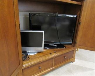 Flat screen TVs - Large entertainment center by Thomasville