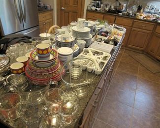 3 sets of china and maybe more....!  Vista Apples, Susan Eslick Block (Full Swing), Studio Nova Cottage Lane, Nikko Secret Garden, Vitromaster Maui, Centura by Corning Ware, Misaki, Dansk Magnolia, Crown Trent Fruit, and so much more.  Some are partial sets or pieces.