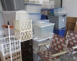Webbed aluminum folding outdoor chairs and lots of storage bins
