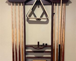 Pool table comes with pool sticks, cues, racks, etc etc.