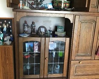 Glass front doors on left end of unit. 