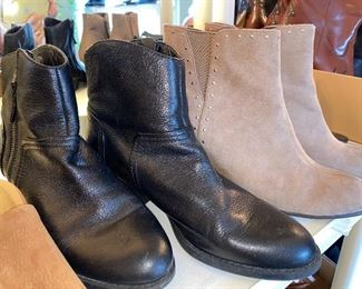 Assorted handbags, shoes, and boots.